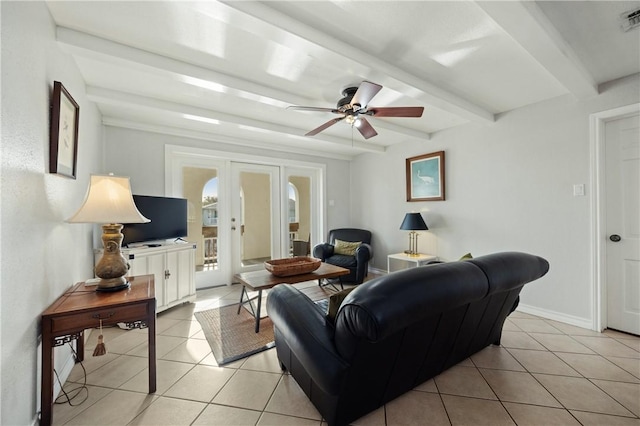 living room with ceiling fan, french doors, beamed ceiling, and light tile patterned flooring