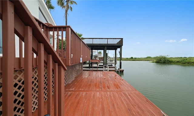 view of dock with a water view