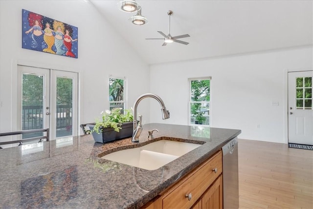3401 Laguna Shores Rd, Corpus Christi, TX 78418 - kitchen with a ceiling fan, french doors, plenty of natural light, and a sink