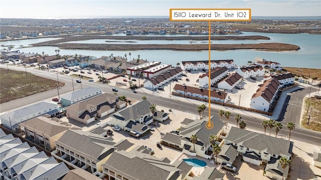 aerial view with a water view and a residential view