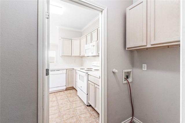 interior space featuring white appliances, light tile patterned flooring, ornamental molding, light countertops, and a textured wall