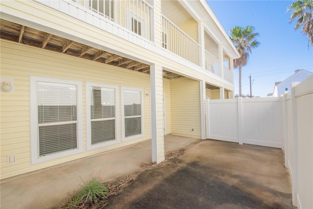 view of patio / terrace featuring fence