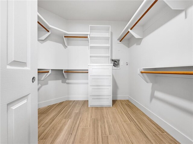 6222 Sadie St, Corpus Christi, TX 78415 - spacious closet with light wood-style floors