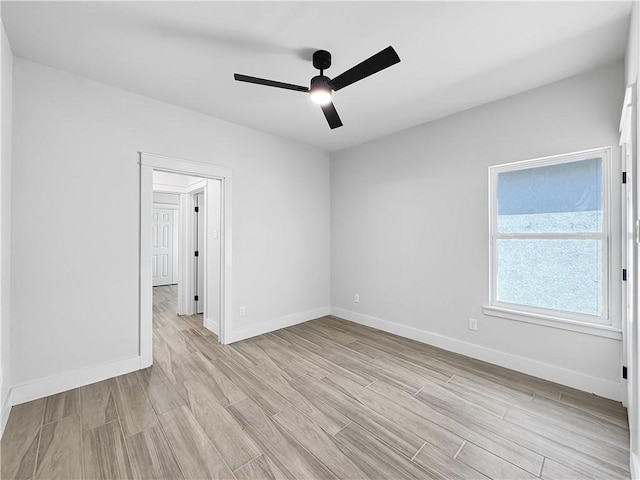6222 Sadie St, Corpus Christi, TX 78415 - unfurnished room with light wood-style flooring, baseboards, and ceiling fan