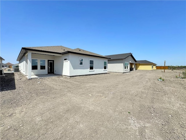 6222 Sadie St, Corpus Christi, TX 78415 - back of property featuring stucco siding and a patio