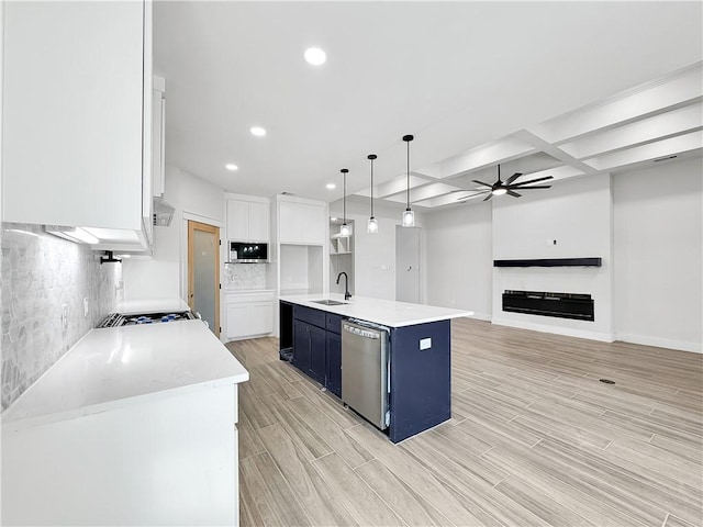 6222 Sadie St, Corpus Christi, TX 78415 - kitchen with a ceiling fan, blue cabinetry, stainless steel appliances, white cabinets, and wood tiled floor