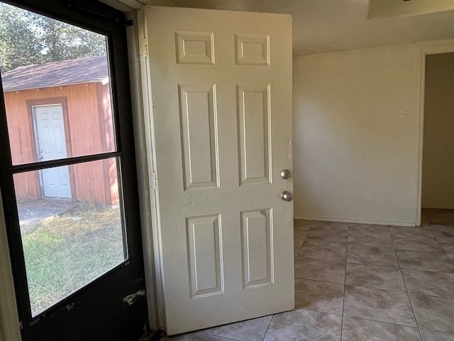 interior space featuring light tile patterned flooring