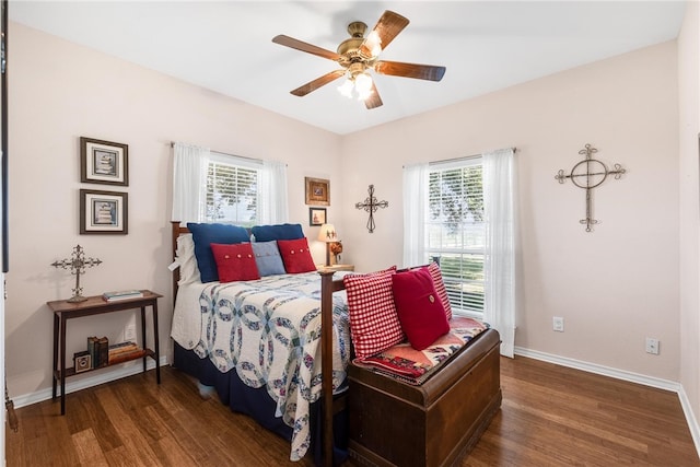 bedroom featuring ceiling fan and dark hardwood / wood-style floors