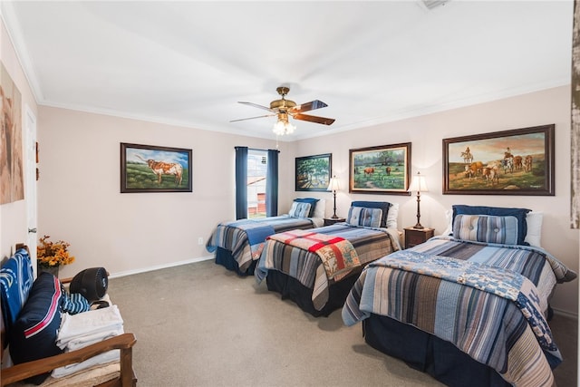 carpeted bedroom with ceiling fan and ornamental molding