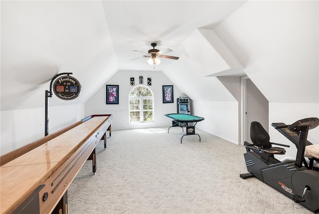 recreation room featuring ceiling fan, light colored carpet, and lofted ceiling