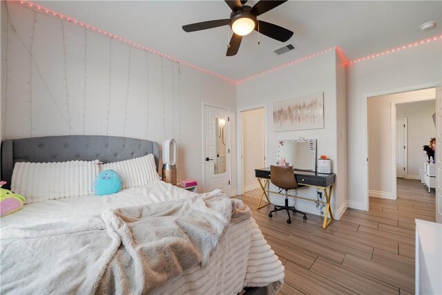 734 Buffalo Creek Dr, Corpus Christi, TX 78415 - bedroom featuring wood finished floors and a ceiling fan