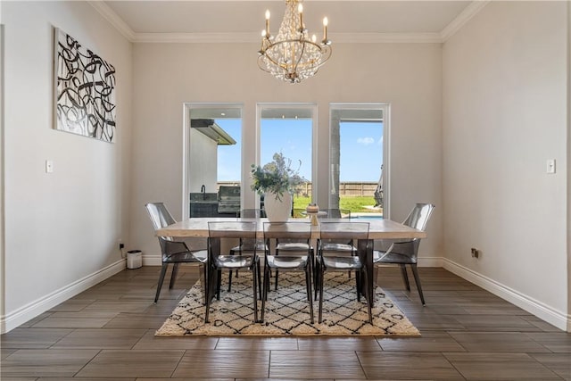 734 Buffalo Creek Dr, Corpus Christi, TX 78415 - dining space with healthy amount of natural light, a chandelier, wood finished floors, and crown molding