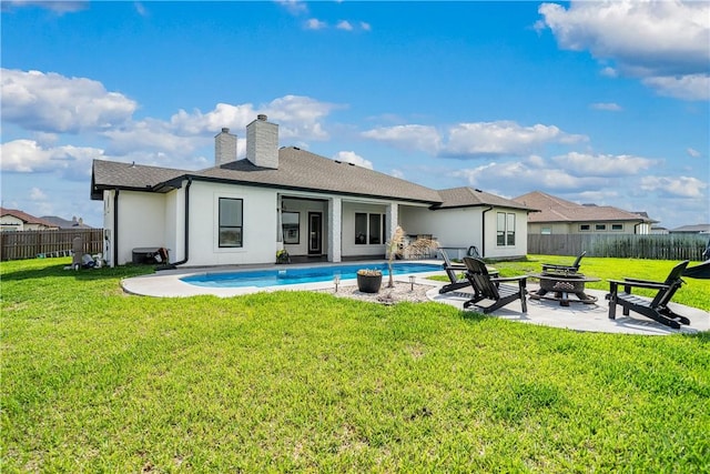734 Buffalo Creek Dr, Corpus Christi, TX 78415 - back of house featuring an outdoor fire pit, a fenced backyard, a patio area, and a chimney