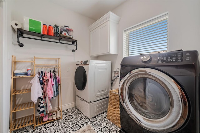 734 Buffalo Creek Dr, Corpus Christi, TX 78415 - laundry area featuring separate washer and dryer, cabinet space, and light tile patterned floors