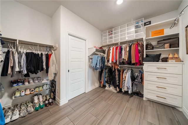 734 Buffalo Creek Dr, Corpus Christi, TX 78415 - walk in closet with wood finish floors