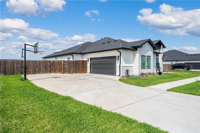734 Buffalo Creek Dr, Corpus Christi, TX 78415 - view of side of home with stone siding, a garage, stucco siding, and driveway