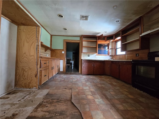 kitchen with black electric range