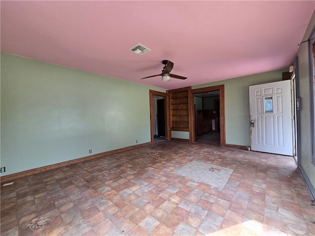 spare room featuring ceiling fan