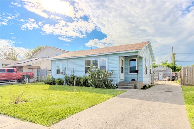 view of front of property with a front lawn