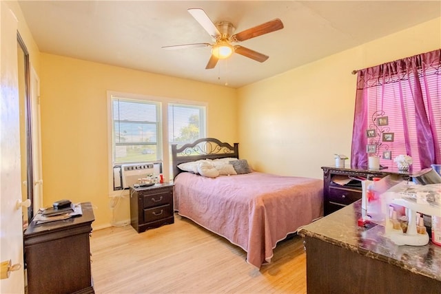 1001 Azalea Dr, Corpus Christi, TX 78408 - bedroom with light wood finished floors and a ceiling fan