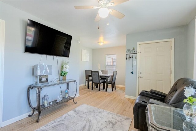 1001 Azalea Dr, Corpus Christi, TX 78408 - living room with wood finished floors, baseboards, and a ceiling fan