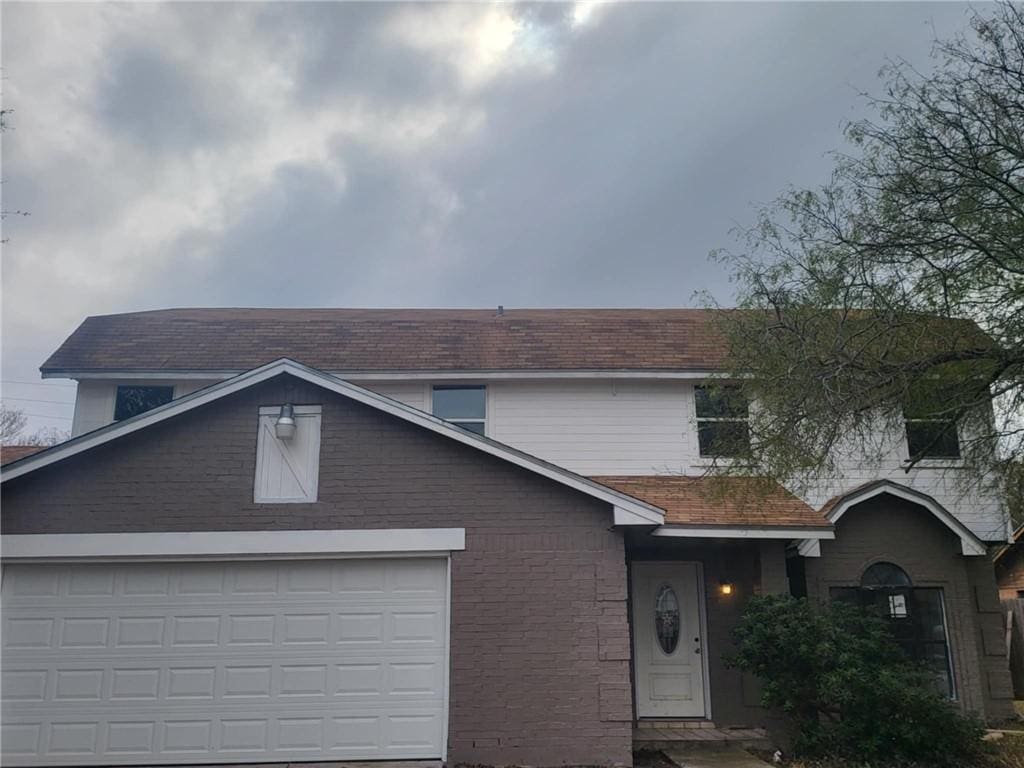 view of property featuring a garage