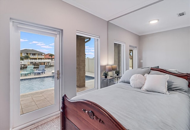 bedroom featuring multiple windows