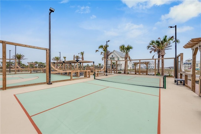 surrounding community with tennis court