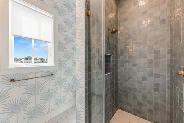 bathroom with tiled shower