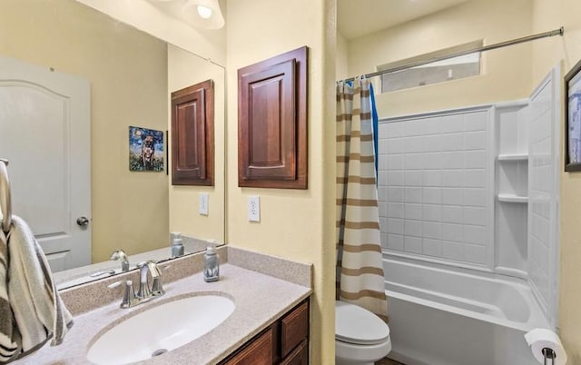 bathroom featuring toilet, shower / bath combination with curtain, and vanity