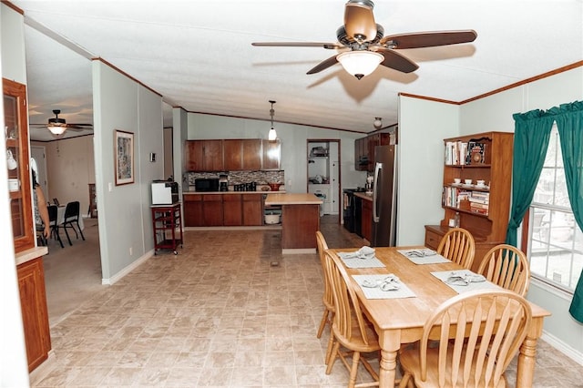 3081 Hackberry Ave, Ingleside, TX 78362 - dining area featuring a ceiling fan, lofted ceiling, and crown molding