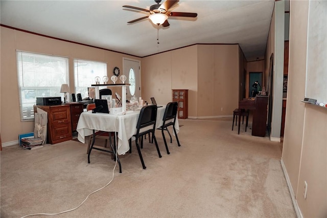 3081 Hackberry Ave, Ingleside, TX 78362 - dining room featuring a ceiling fan, light colored carpet, and crown molding