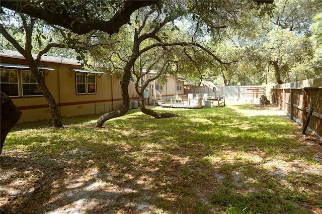 3081 Hackberry Ave, Ingleside, TX 78362 - fenced backyard with a patio