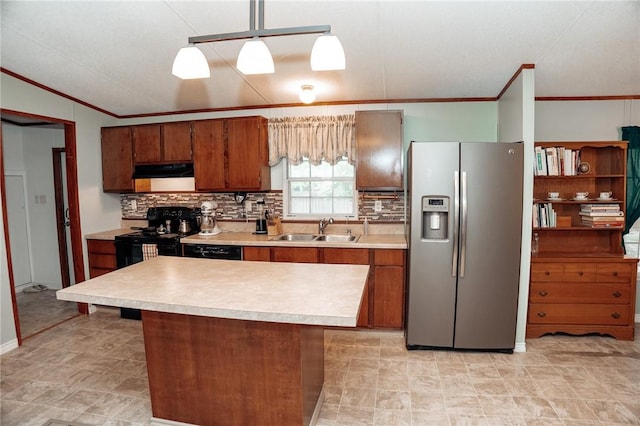3081 Hackberry Ave, Ingleside, TX 78362 - kitchen with black appliances, under cabinet range hood, crown molding, light countertops, and backsplash