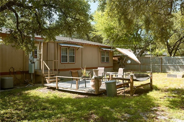 3081 Hackberry Ave, Ingleside, TX 78362 - rear view of property with a deck and entry steps