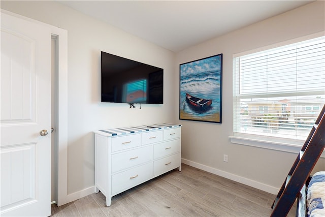 bedroom featuring light hardwood / wood-style floors