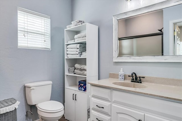 67 Augusta Cir, Aransas Pass, TX 78336 - bathroom featuring vanity and toilet