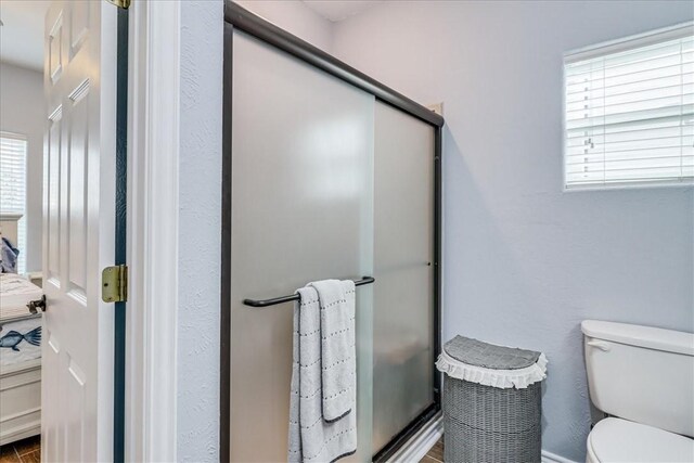 67 Augusta Cir, Aransas Pass, TX 78336 - bathroom with toilet and a shower stall