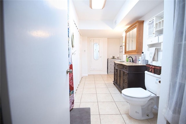 full bath with visible vents, vanity, toilet, and tile patterned floors