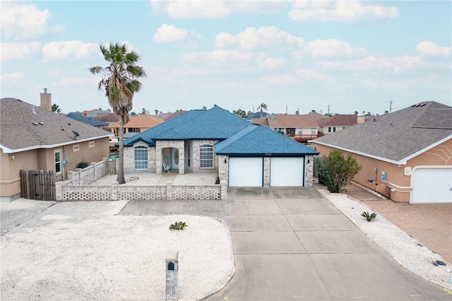 ranch-style house featuring a garage