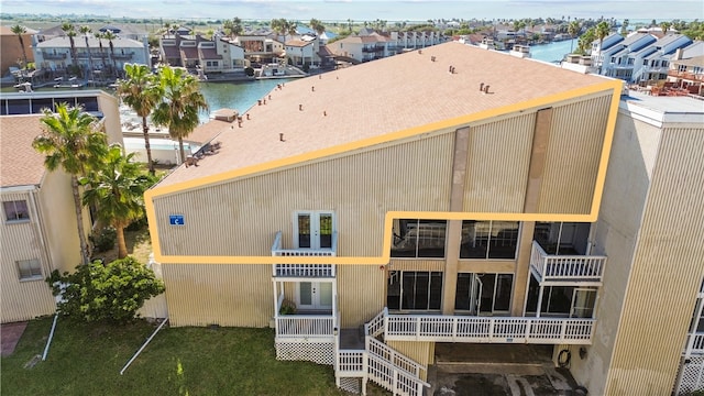 aerial view featuring a water view