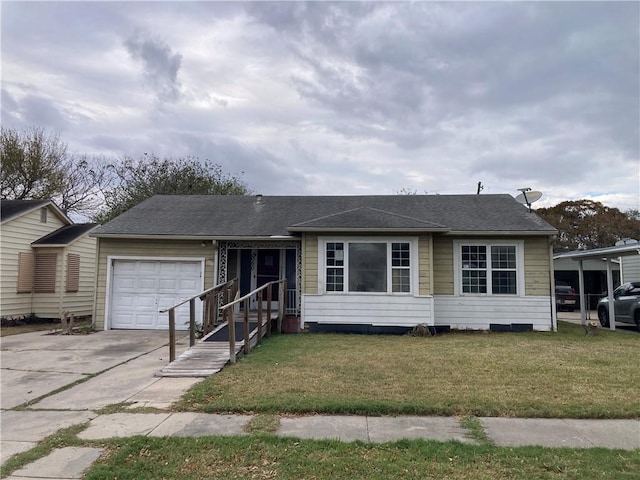 view of front of house with a garage and a front lawn