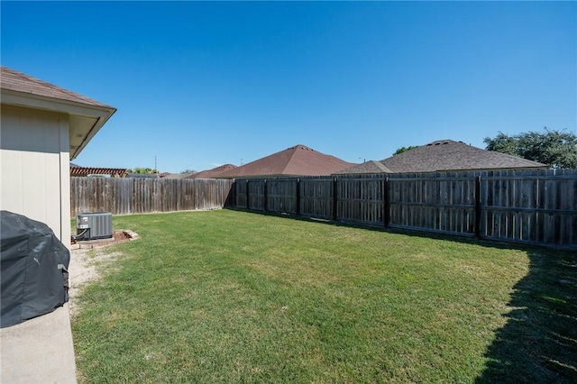 1522 W Nelson Ave, Aransas Pass, TX 78336 - view of yard featuring central AC