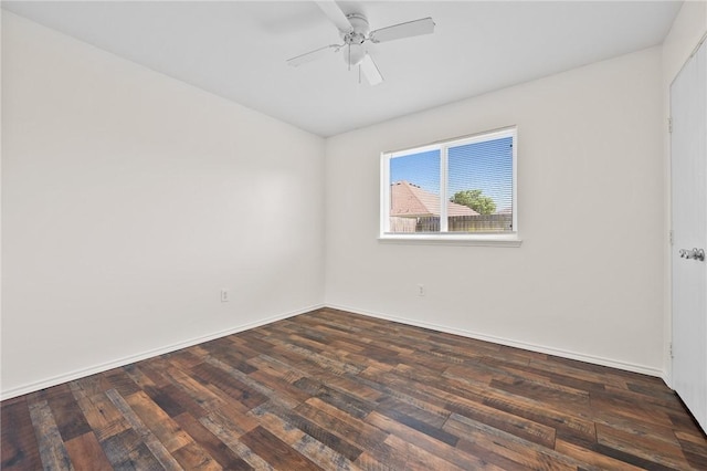 1522 W Nelson Ave, Aransas Pass, TX 78336 - empty room with a ceiling fan, dark wood finished floors, and baseboards