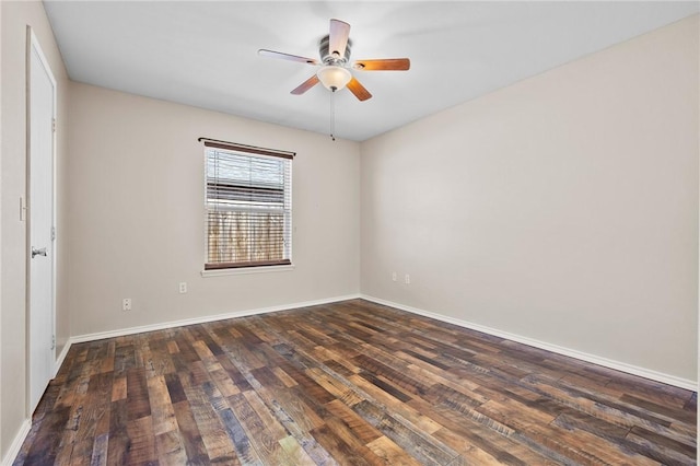 1522 W Nelson Ave, Aransas Pass, TX 78336 - spare room with ceiling fan, dark wood-type flooring, and baseboards