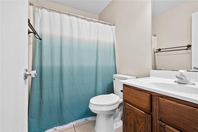 1522 W Nelson Ave, Aransas Pass, TX 78336 - full bath with tile patterned flooring, toilet, vanity, and a shower with curtain