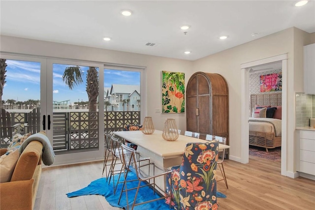 dining room with light hardwood / wood-style floors