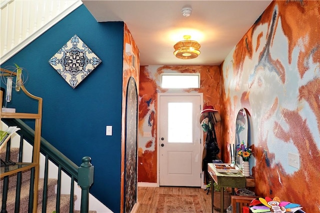 entryway with light hardwood / wood-style floors