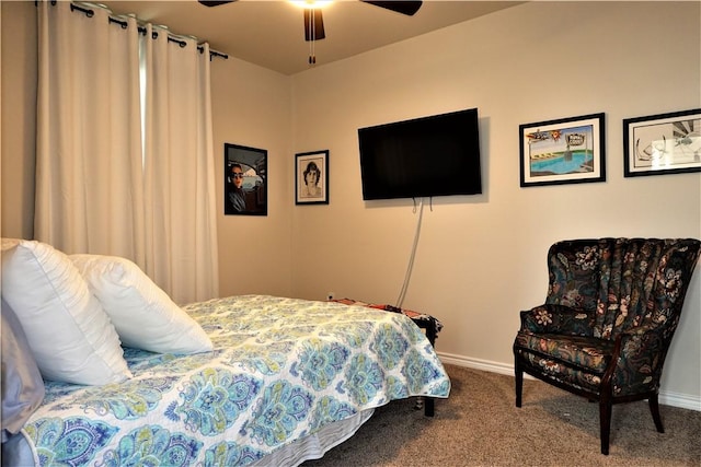 bedroom with ceiling fan and carpet floors