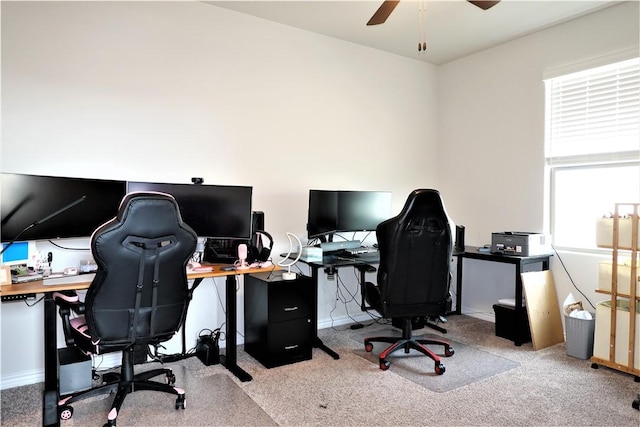 carpeted office with ceiling fan